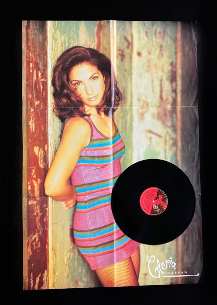 Gloria Estefan : Miami Hit Mix / Christmas Through Your Eyes (12", Single, Pos)